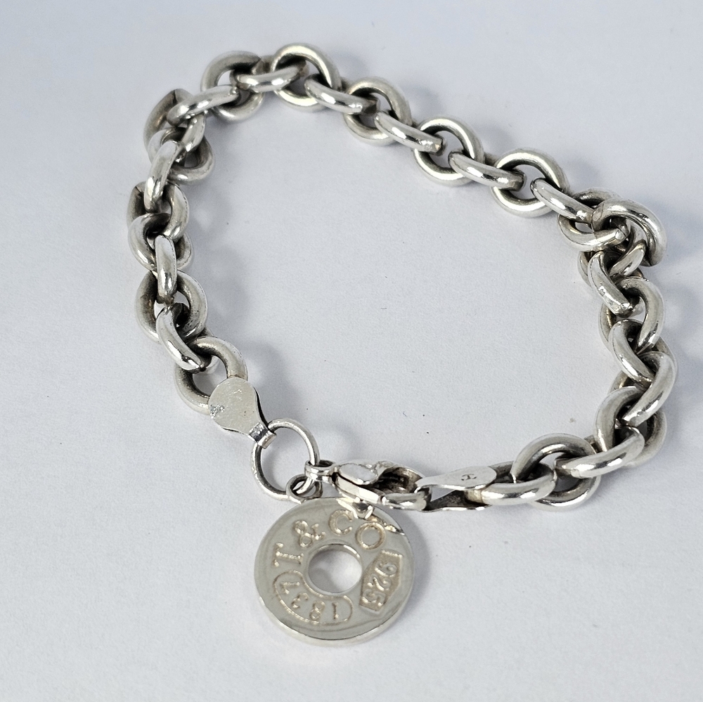 Authentic Tiffany and Co. Sterling Silver Charm Bracelet!